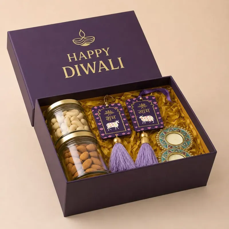 Inside view of Diwali Shubh Labh hamper showing premium dry fruits box alongside decorative wall hanging