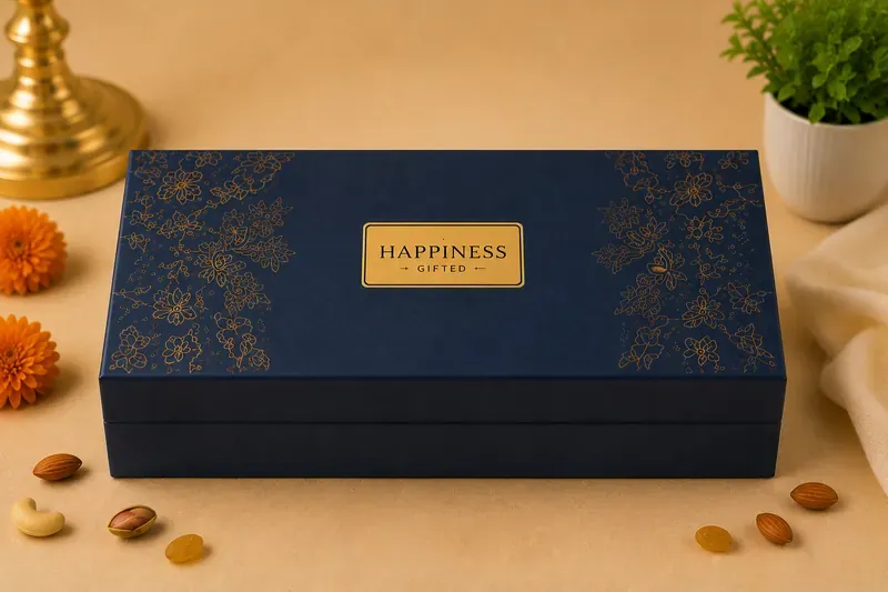 Close-up of Happiness Gifted premium dry fruits gift box minimalist black packaging with gold accents