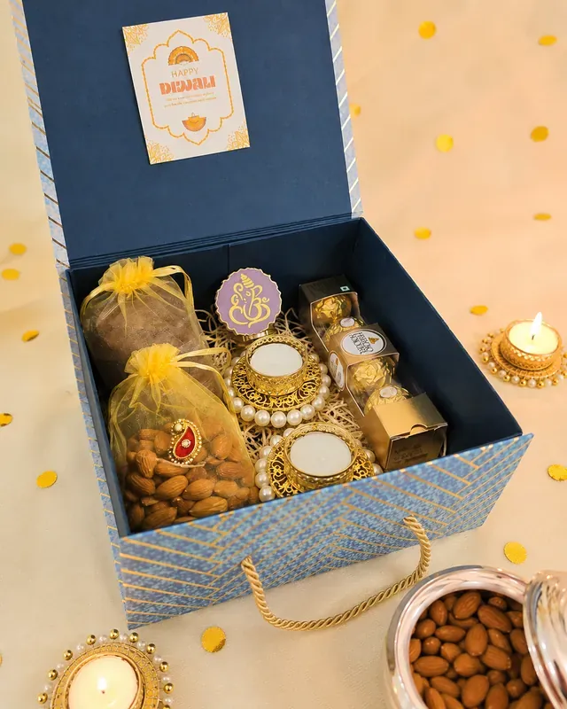 Close-up of luxury dry fruits and Kahwa tea gift box showing premium packaging and gold foil details
